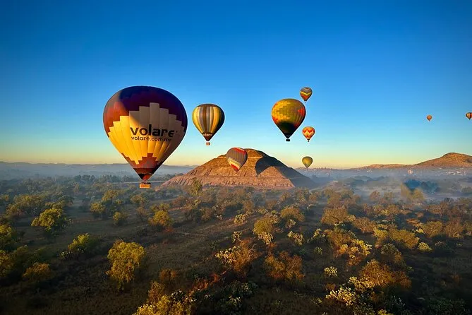 Balloon flight above the Avenue of the Dead and Pyramid of the Sun near Mexico City at sunrise