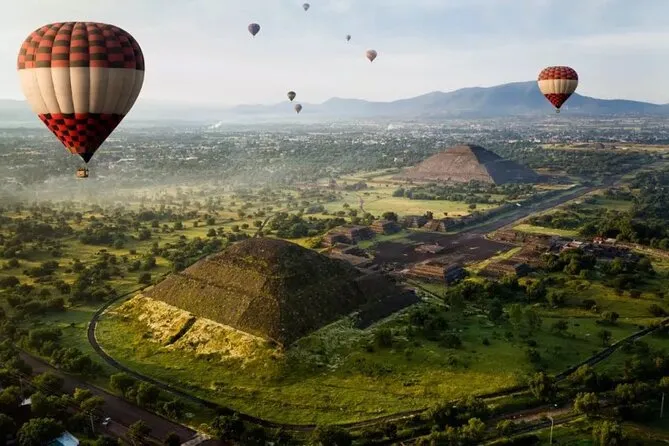 Hot air balloon at sunrise above Teotihuacan archaeological site on a Mexico City balloon flight